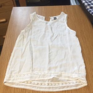White tank top: brand is “Old Navy”
